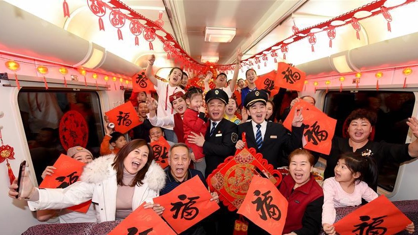 暖暖回家路——T48次列车上的春晚