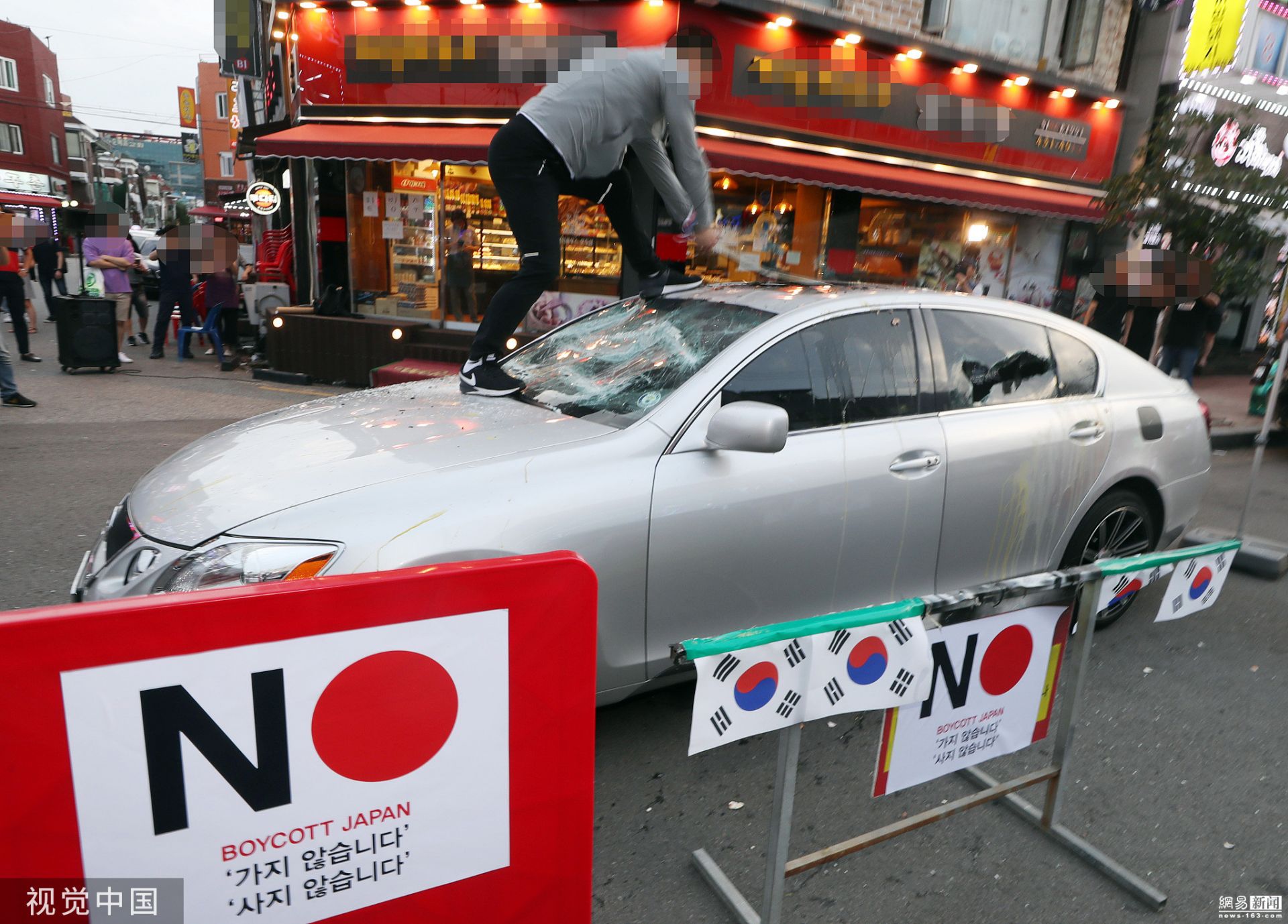 韩国民众抗议日本出口管制 怒砸日系车 - 精选轮播图 - 新湖南