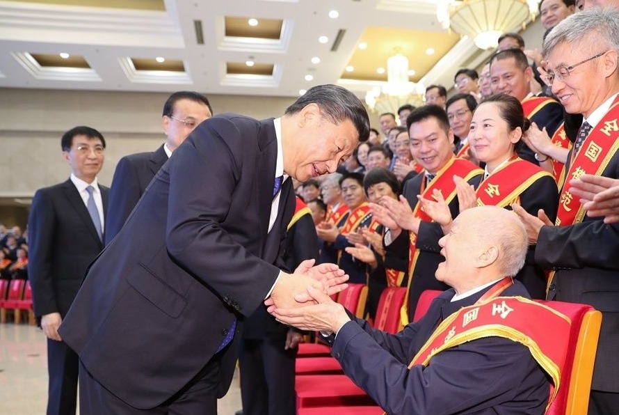 习近平会见全国退役军人工作会议代表 