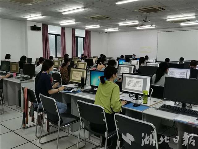 |评前培训、健康监测、封闭管理，直击高考网上评卷现场