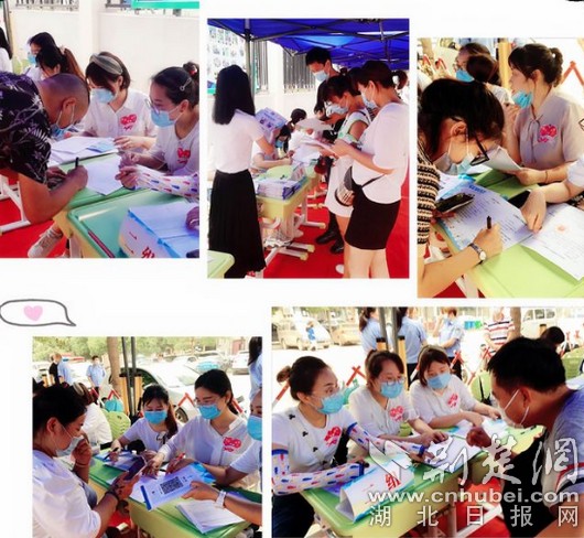 |洪山实验小学南校区新生领取《义务教育入学通知书》