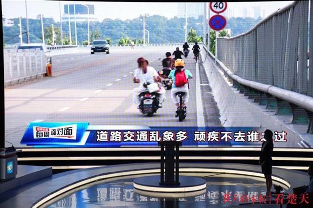 |取缔圈占的公共停车位，武汉电视问政曝光后这些问题开始整改