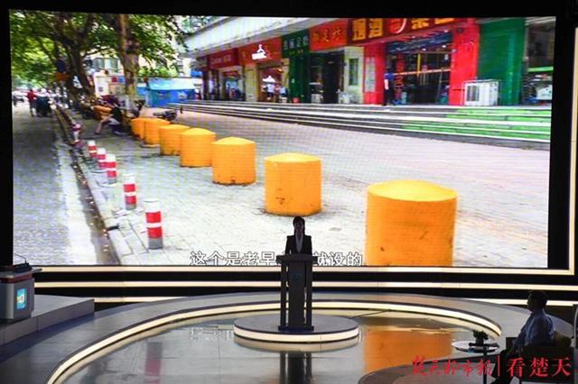 |取缔圈占的公共停车位，武汉电视问政曝光后这些问题开始整改