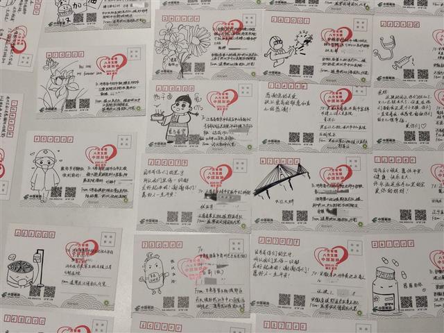 |遥寄万封明信片收获万份袍泽情
