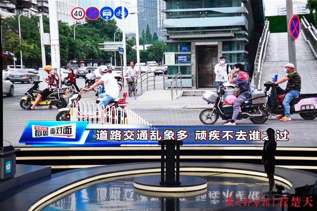 |取缔圈占的公共停车位，武汉电视问政曝光后这些问题开始整改