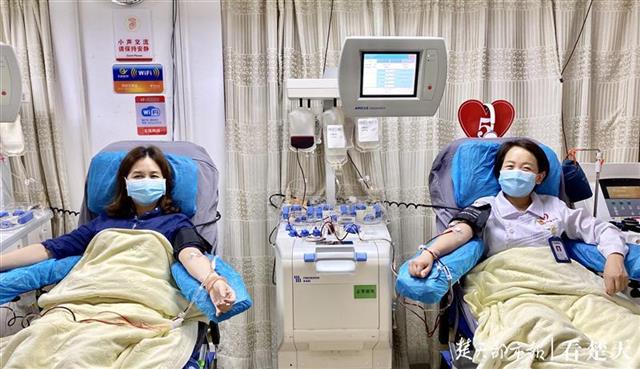 |再把热血留在武汉！“抗疫战士”返汉挽臂再献爱