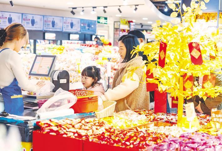 熱氣騰騰迎馬年 年貨市場(chǎng)供銷旺