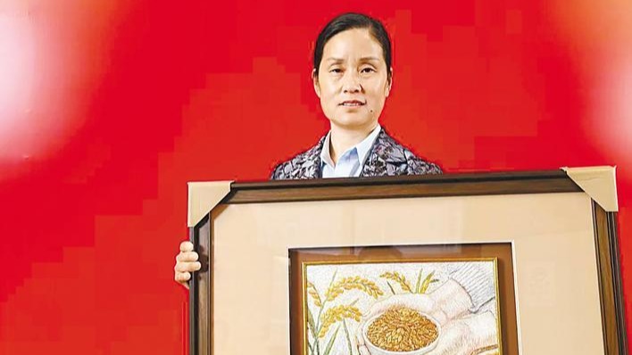 湖北“女粮王” 带着“金饭碗”上两会