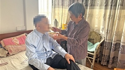 宜都女子48年守护伤残英雄