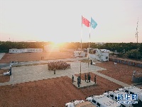 中国第二批赴苏丹达尔富尔维和直升机分队举行新年升国旗仪式