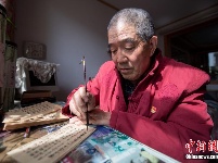 山西七旬老人耗时八年手抄四大名著