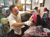 挽脸美容在台湾重兴 爱美男性成新粉