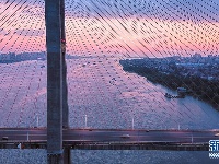 夏日夕阳红似火!鸟瞰余晖下的湖北鄂黄长江大桥