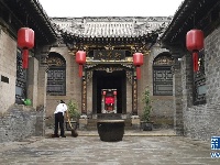 乔家大院闭馆十天重开：门票降价 大部分商店被拆