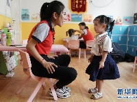 武汉特教教师 用爱的“魔法”打开听障宝宝的无声世界